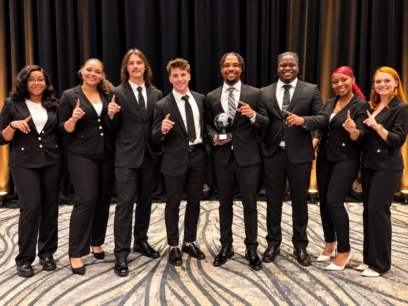 Great Lakes Customer Group team members receiving a company award